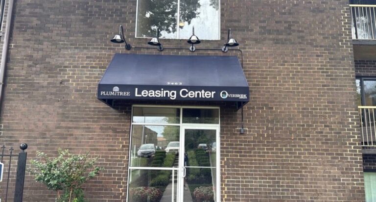 Leasing center awning after cleaning in Ellicott City, Maryland.