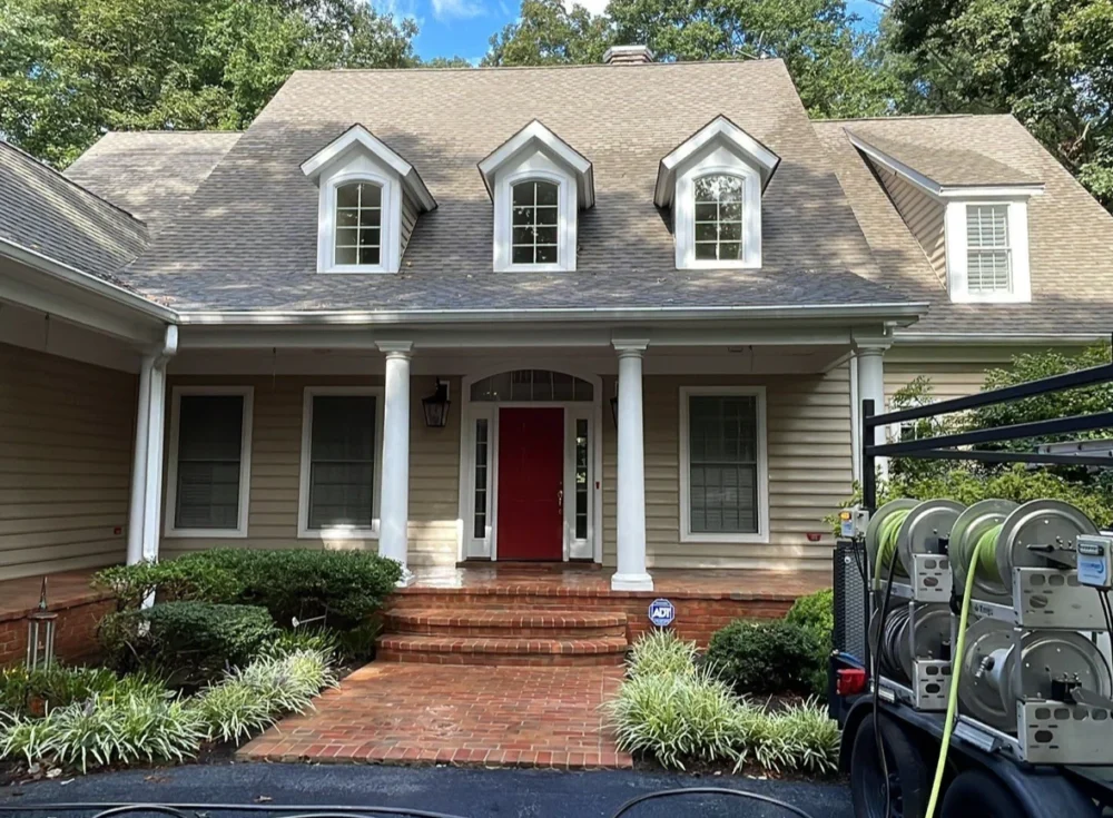 The same Glenwood home after roof and house soft washing