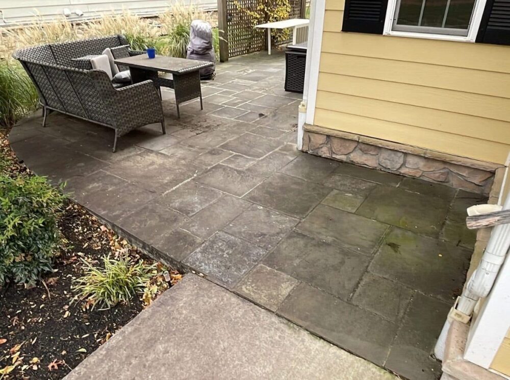 Stone patio in Ellicott City, Maryland before cleaning